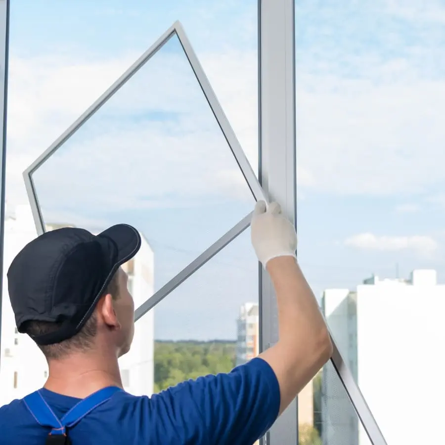 Professional Installing a Window Screen Frame