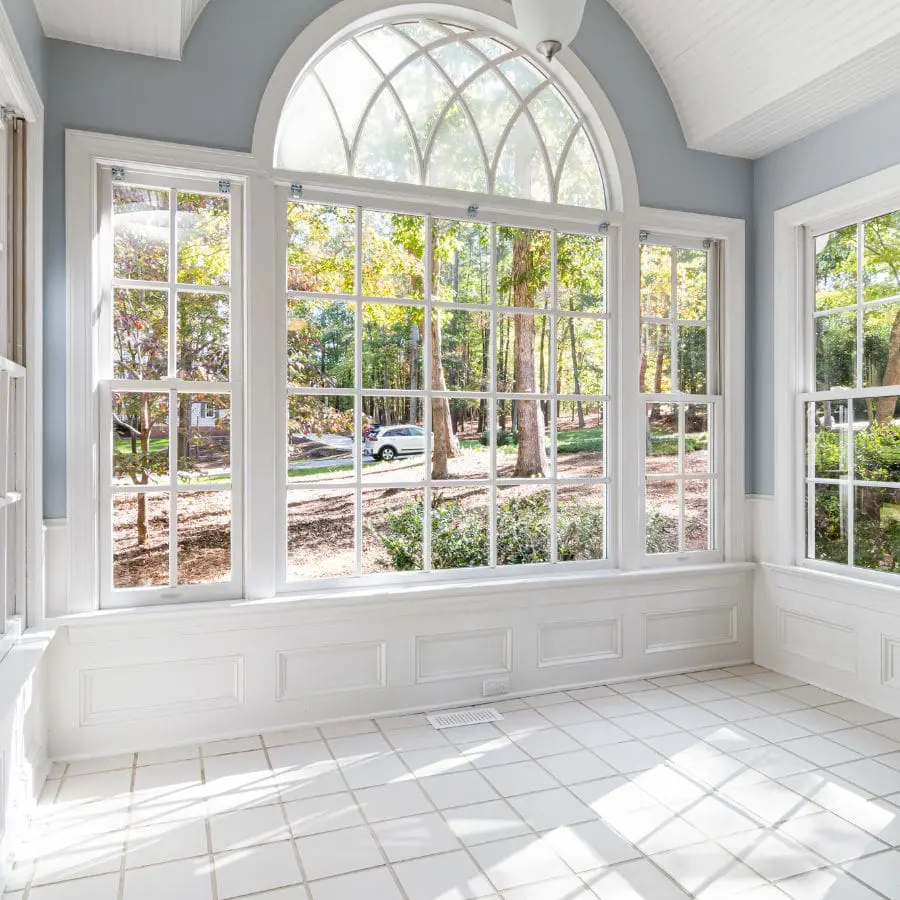 Room with Arched Window and Outdoor View