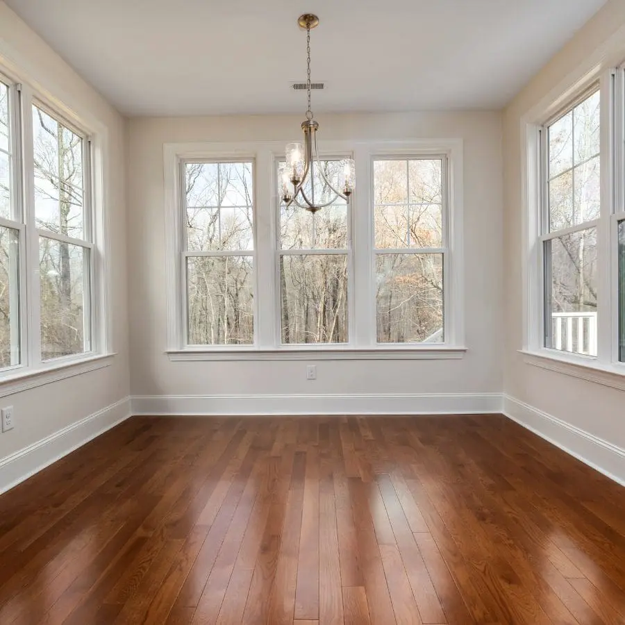 Room with Large Windows and Chandelier