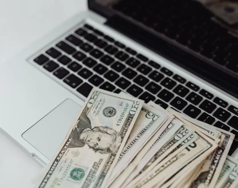Cash Placed On Laptop