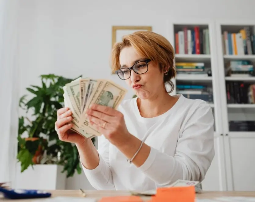 Woman Counting Money